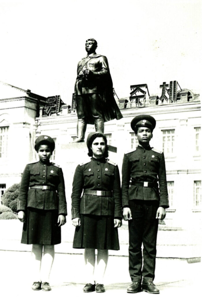 Monica with her siblings, Maribel and Fran, at Mankyongtae Revolutionary Boarding School, Pyongyang