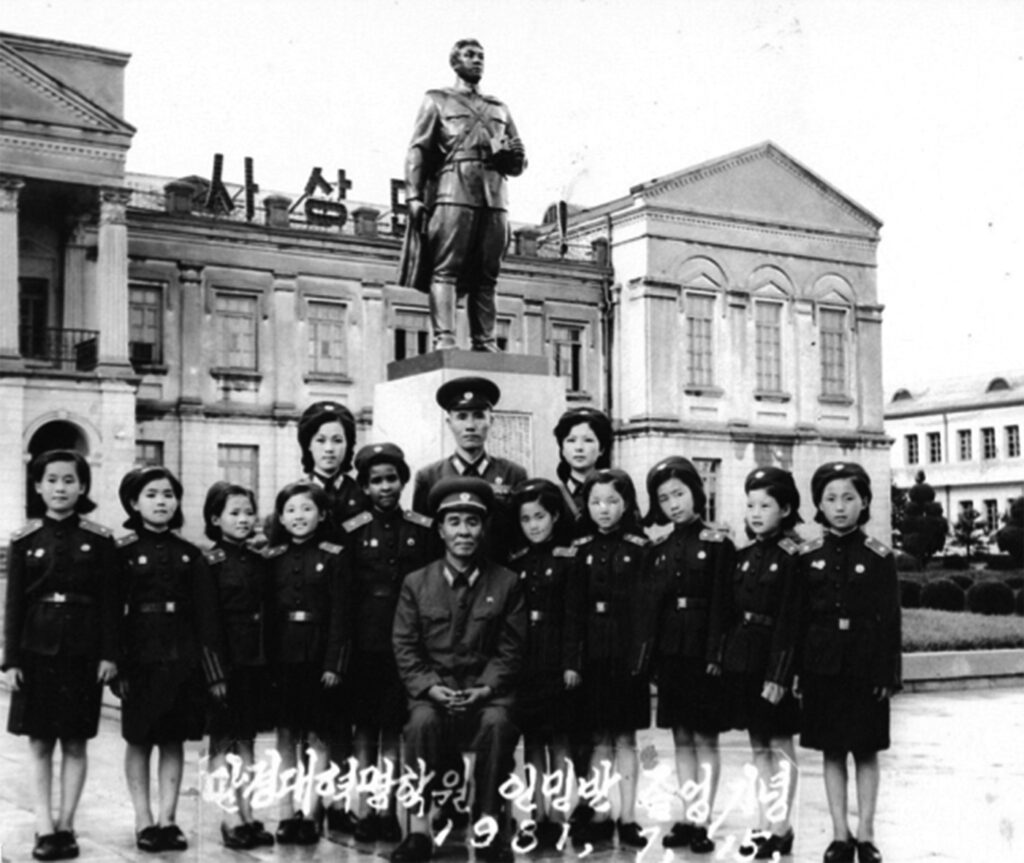 Monica with her platoon and the school director O Jea-won.